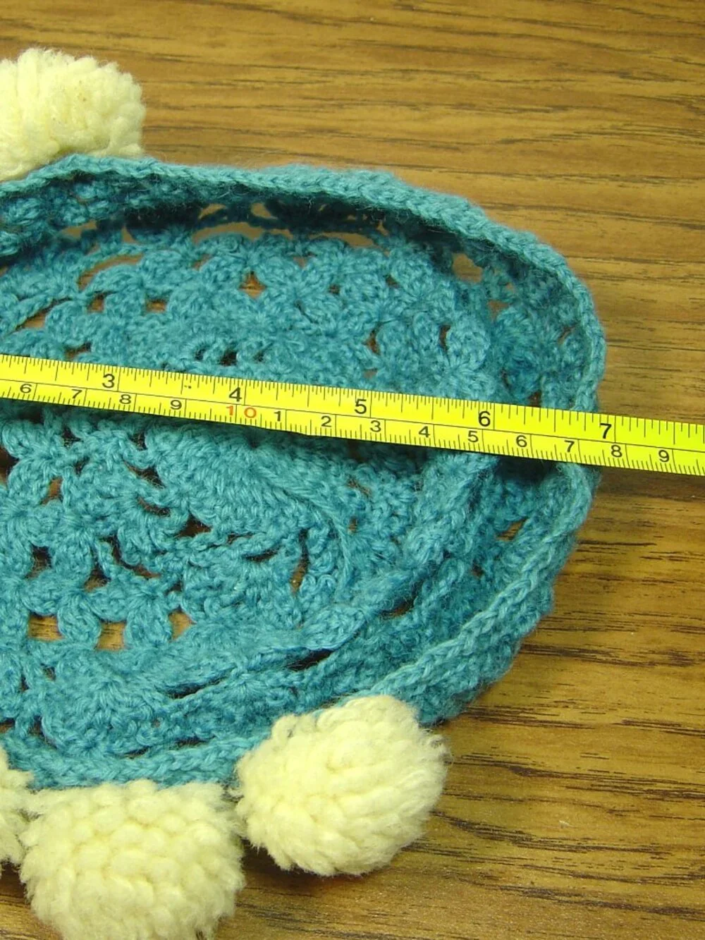 Vintage handmade blue crocheted baby/toddler hat/cap with pompom trim